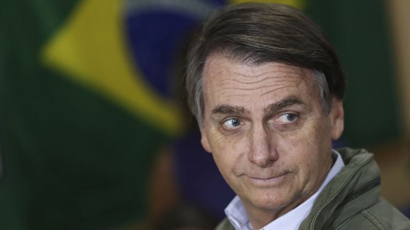 Jair Bolsonaro con bandera