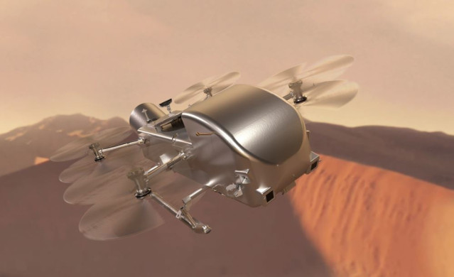 Impresión artística de Dragonfly volando sobre las dunas de Titán, la luna de Saturno.