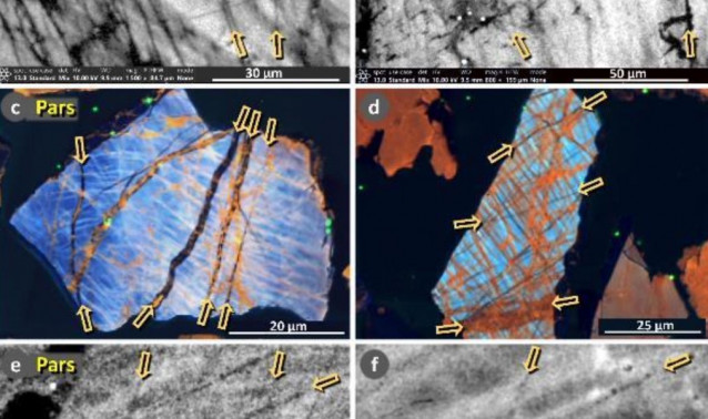 Granos de cuarzo impactados, con fisuras rellenas de vidrio fundido.