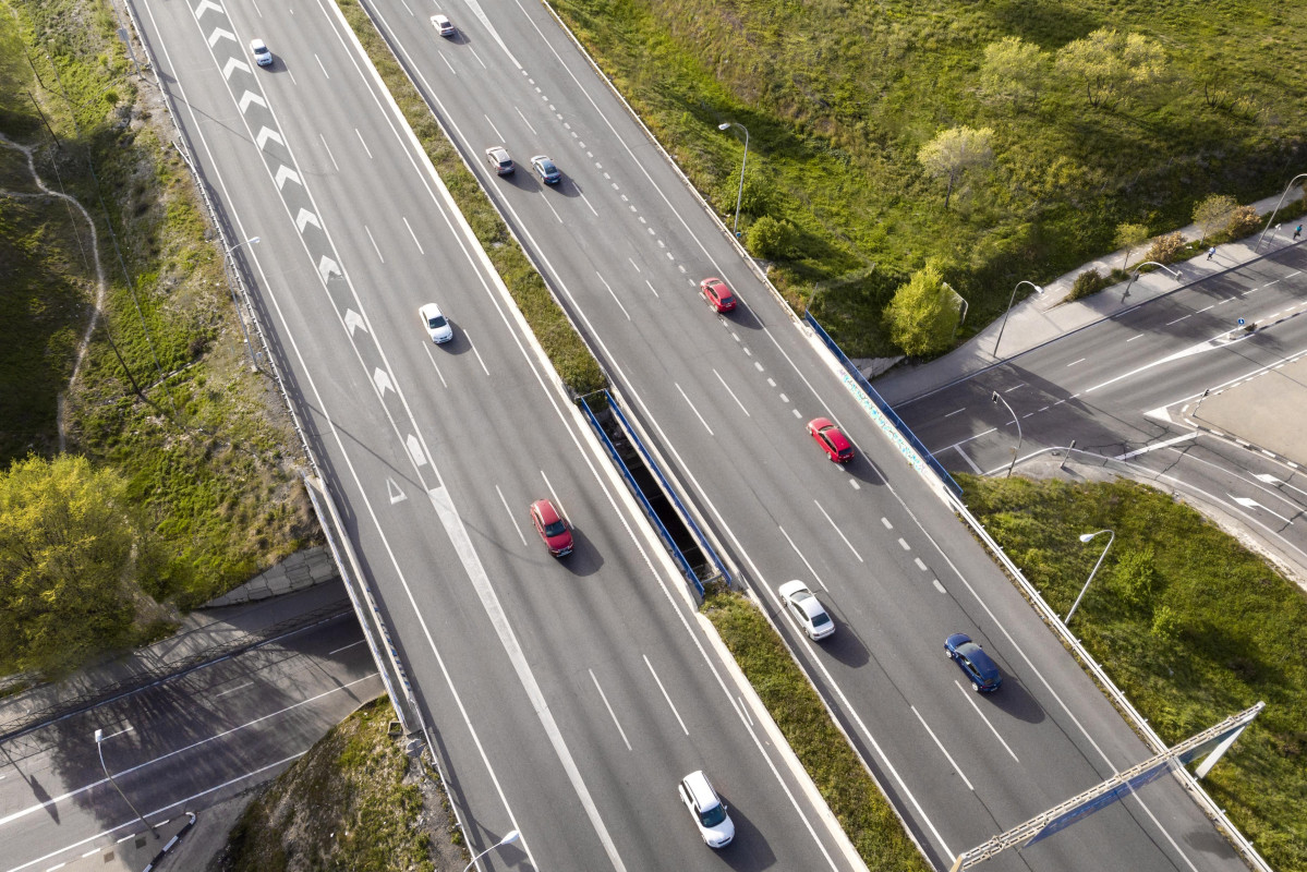 Cars driving street aerial view (1)