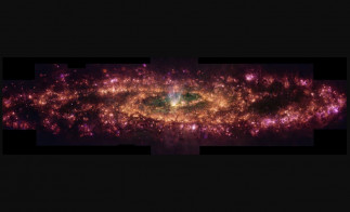 Esta imagen muestra la galaxia del Escultor bajo una nueva luz. Esta composición en falso color muestra longitudes de onda específicas de la luz emitida por el hidrógeno, el nitrógeno, el azufre y