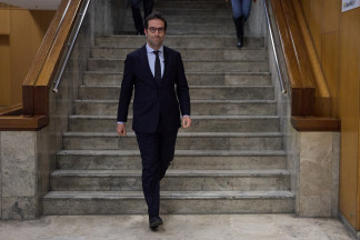 Archivo - El ministro de Economía, Comercio y Empresa, Carlos Cuerpo, a su llegada a una comparecencia ante los medios de comunicación en el Ministerio de Economía, Comercio y Empresa, a 4 de abril