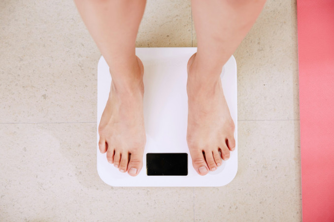 Person on Digital Scale