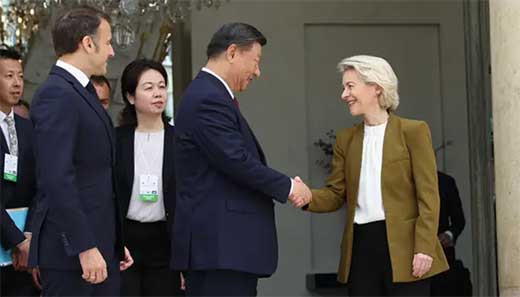 XI