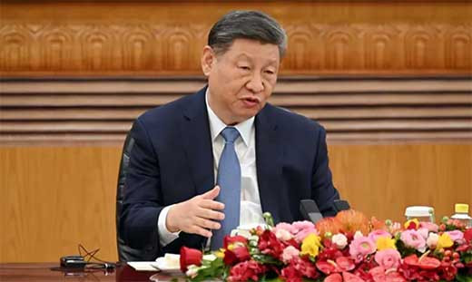 XI