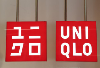 Archivo - Cartel de la nueva flagship store de Uniqlo, a 26 de marzo de 2025, en Madrid (España). El nuevo local ubicado en el complejo de Azca en el Paseo de la Castellana cuenta con una superficie 
