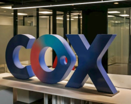 Archivo - Logo de Cox.