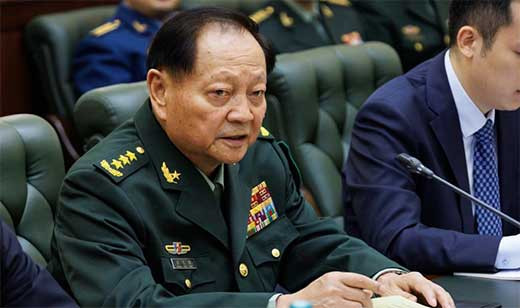 XI
